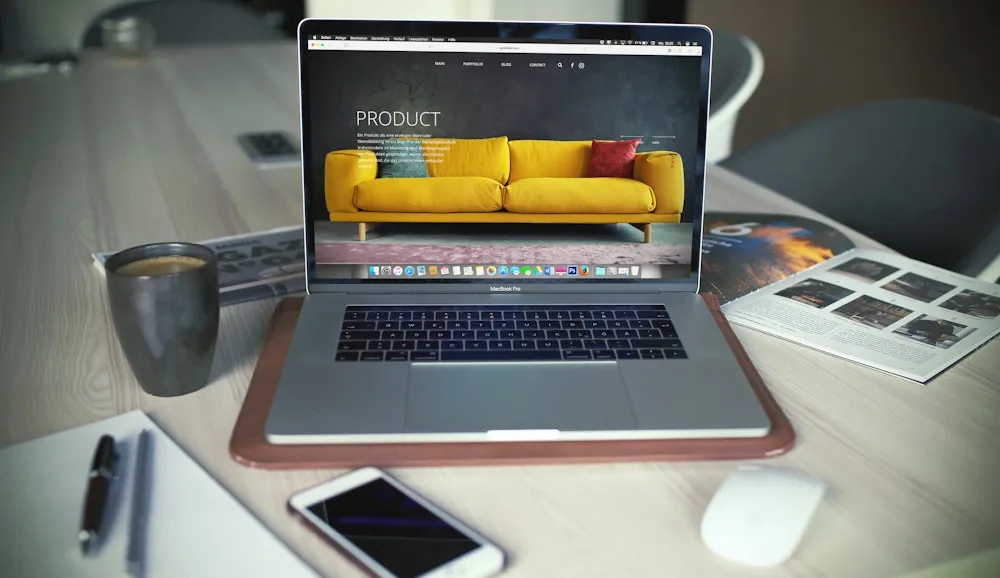 Website design workspace with laptop